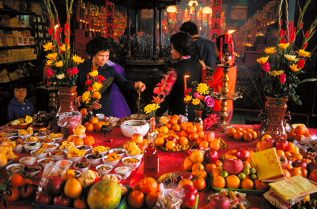 Temple offerings in Taiwan from Asia Grace by Kevin Kelly